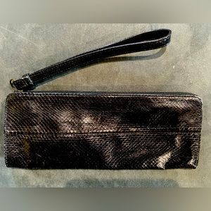 Biern wallet clutch brand new with tags and duster.  Strap length 9”